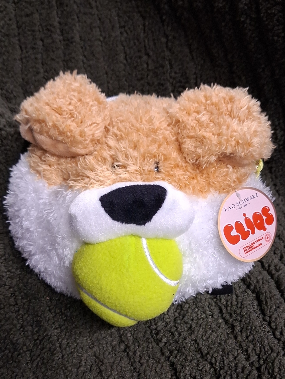 FAO Schwarz Tan and White Plush Dog Toy with Bright Yellow Ball